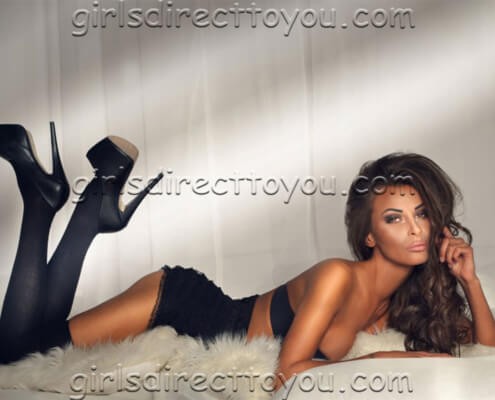 Vegas Strippers | Vanessa Laying Down Photo | Girls Direct To You